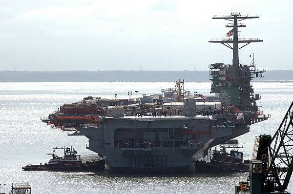 Tugs move USS Carl Vinson